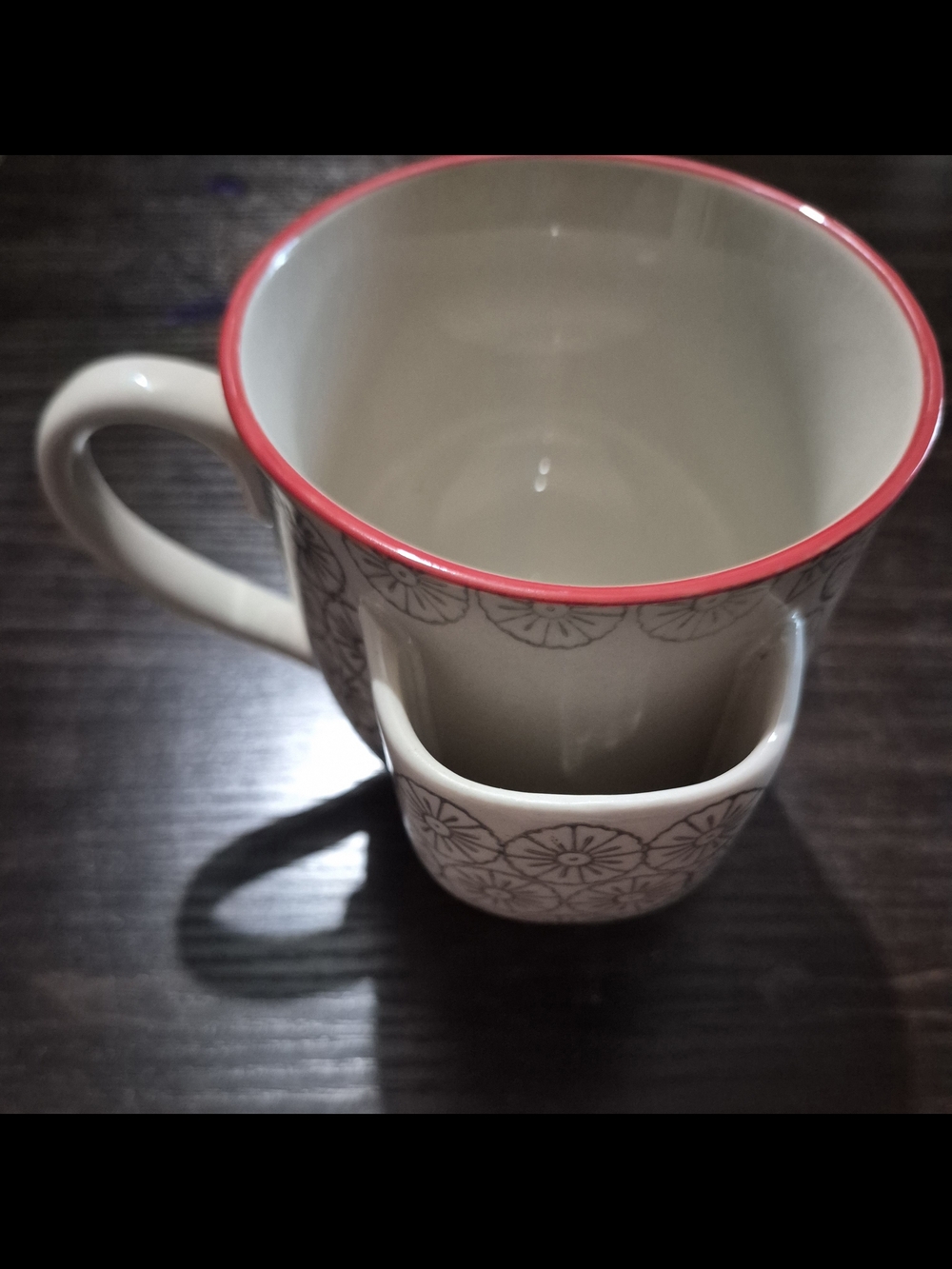 The Creative Co-op Cup Mug with Tea Bag Holder in Gray Starburst Atomic Design.